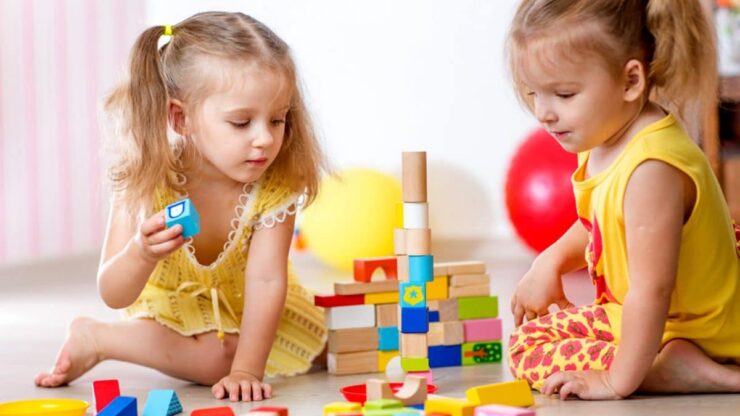 girls playing with toys