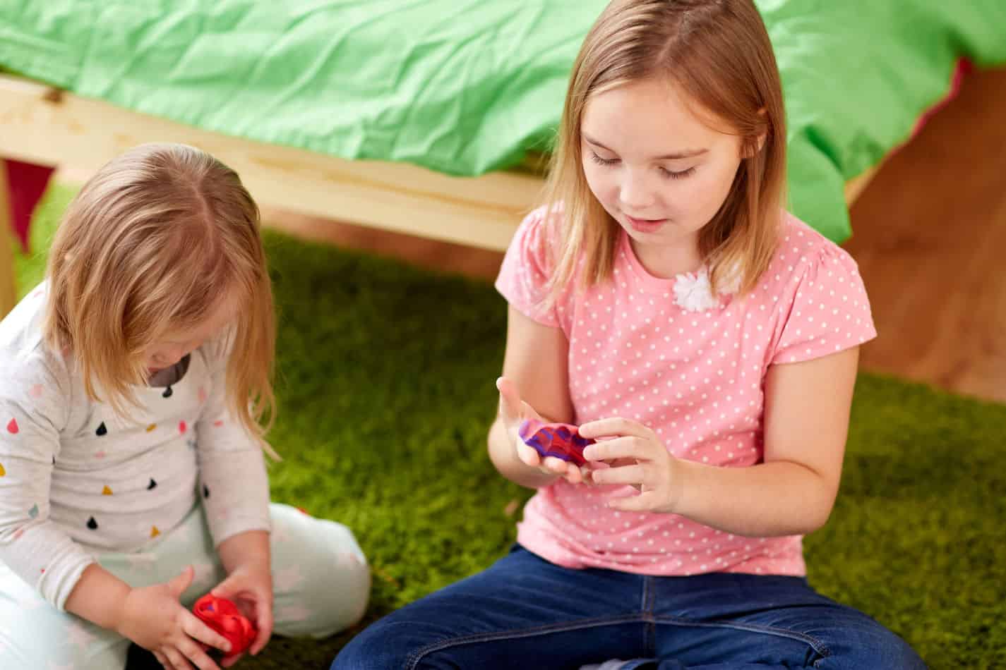 girls playing with toys